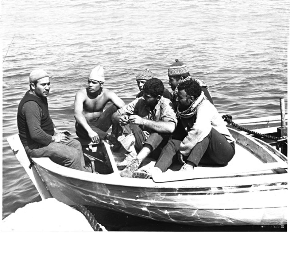 cov-men-in-boat-945x858.jpg