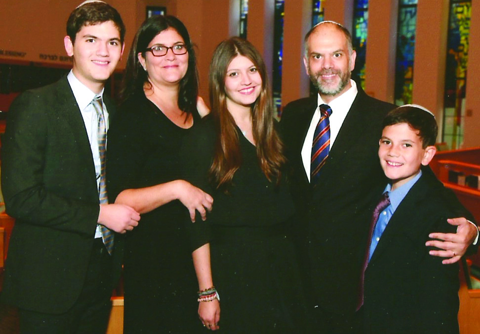 Shalhevet High School Dean of Students Jason Feld (second from right), who has accepted a job in Seattle as head of school of Northwest Yeshiva High School, poses with his family. He starts that position on July 1. Photo courtesy of Feld.