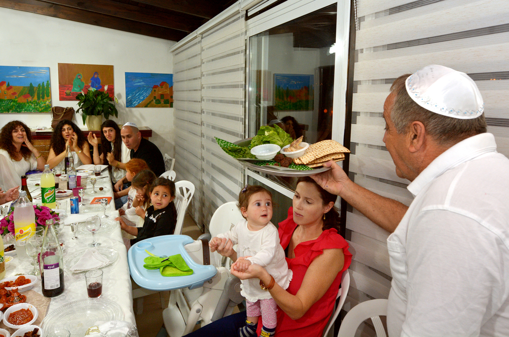 Jewish family celebrate Passover Seder.