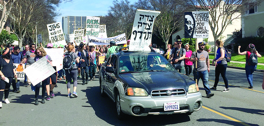 Protesters march through Beverly Hills March 19 to protest AIPAC. Photo by Eitan Arom.