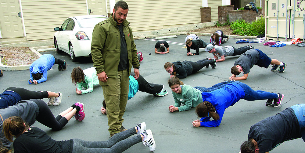 Sean Phil, an Agoura Hills resident and former Israel Defense Forces officer, leads a training exercise for teenage students at “Israel 200.” Photo courtesy of CTeen Conejo.