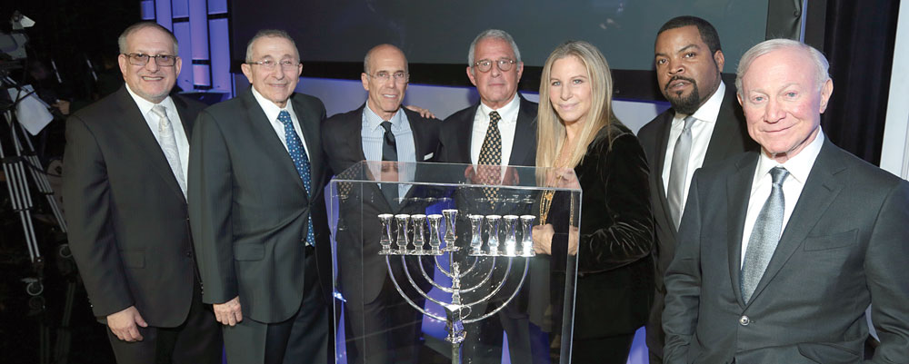 From left: Rabbi Meyer H. May, executive director of the Simon Wiesenthal Center (SWC); Rabbi Marvin Hier, SWC founder and dean; dinner chair and SWC trustee Jeffrey Katzenberg; honoree Ron Meyer; singer-actress Barbra Streisand; host Ice Cube; and Larry Mizel, chairman of the SWC board of trustees. Photo by Alex J. Berliner/ABImages