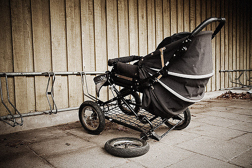 broken stroller of homeless family
