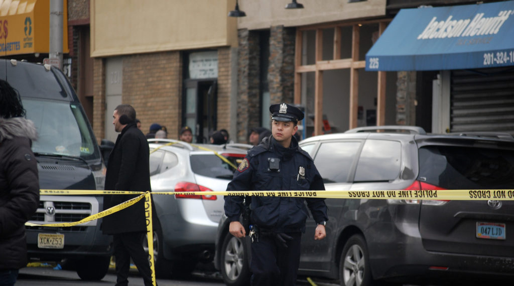 Hanukkah Candles Lit at Jersey City Kosher Market where 3 were Killed