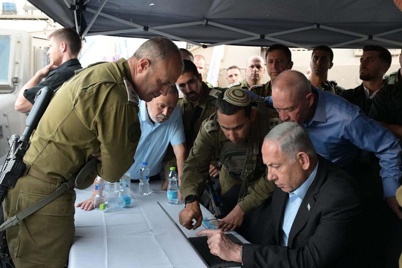 Prime Minister Benjamin Netanyahu and Defense Minister Yoav Gallant at the site of a terrorist attack in the South Hebron Hills in Judea, Aug. 21, 2023. Credit: PMO.